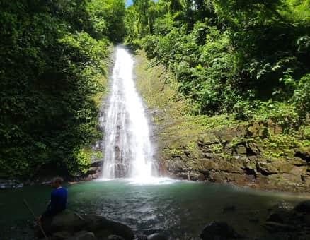 Hikers on the Santa Lucía Falls Waterfall Trek Tour trail in Uvita