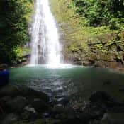 Scenic waterfall in lush rainforest at Santa Lucía Falls, Uvita, Costa Rica